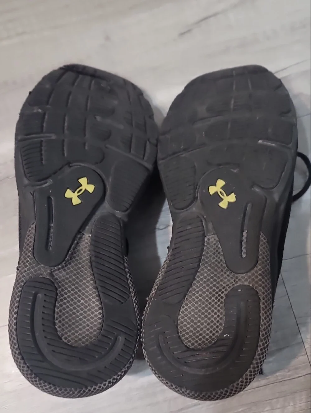 Under Armour Men’s Black Running Shoes with Neon Green Accents
